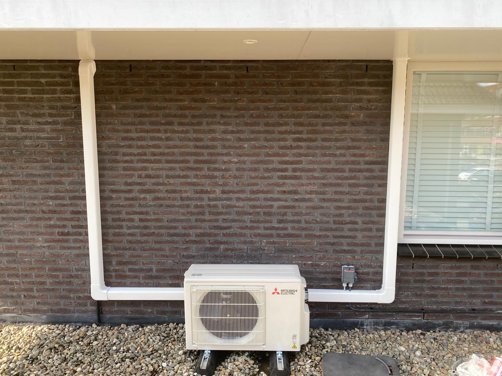 Mitsubishi buitenunit met strakke leidingafwerking